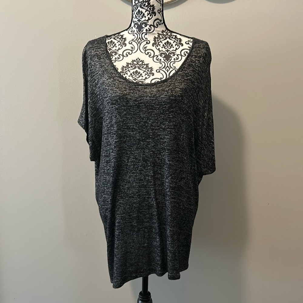 NWOT.  Woman’s cap sleeve, round neckline blouse in black & white heathering.